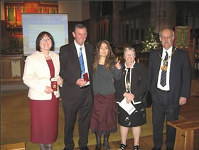 Bill and Nobie being presented with the Bethlehem passport